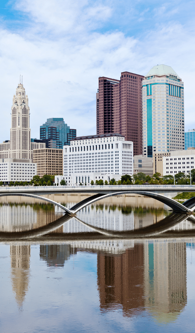 Columbus OH Technology Staffing and Recruiting - image of downtown Columbus, OH from riverfront with bridge and buildings in background