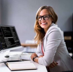 Developer Programmer Woman hired from Direct Hire IT Technology Recruiting firm Coding Software On Computer